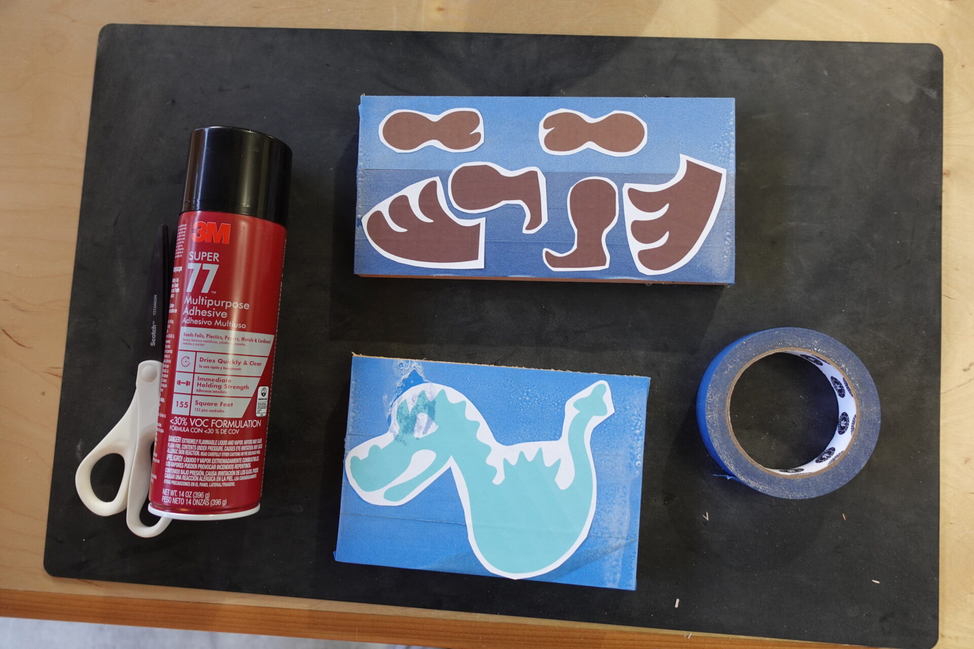 Step 1 with masking tape and adhesive with the Dragon Stencil
