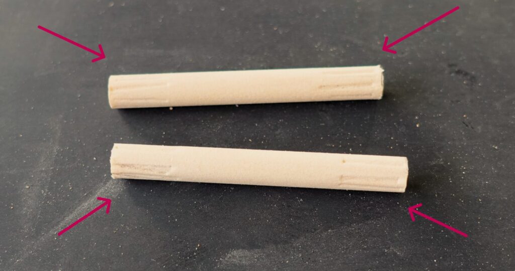 Two dowels with crimped edges