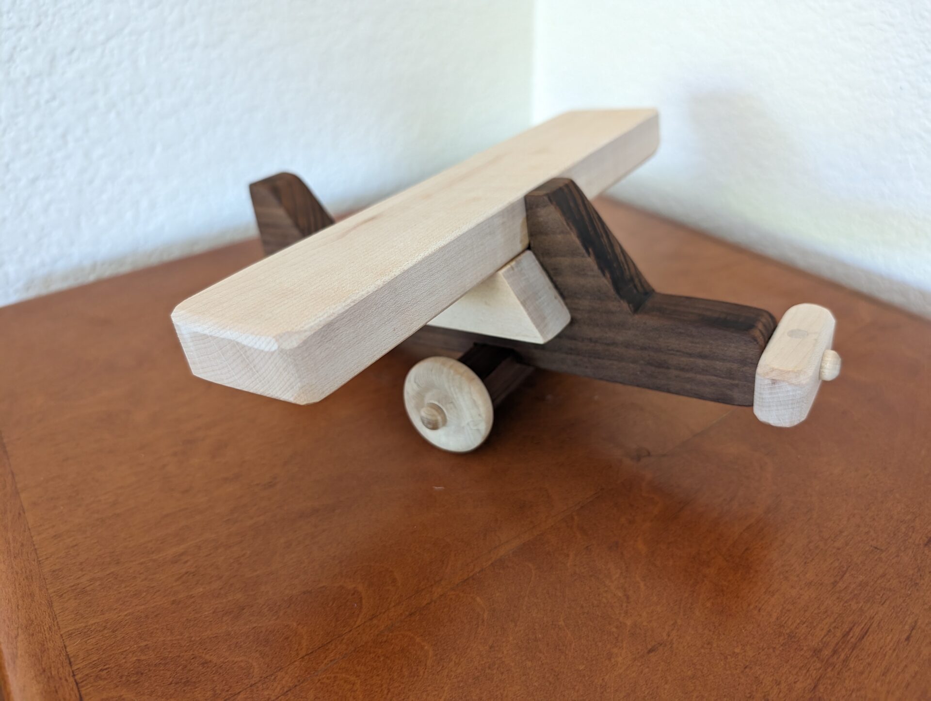 Completed wooden toy monoplane